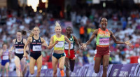 Faith Kipyegon wins 1500m final for record third Olympic gold