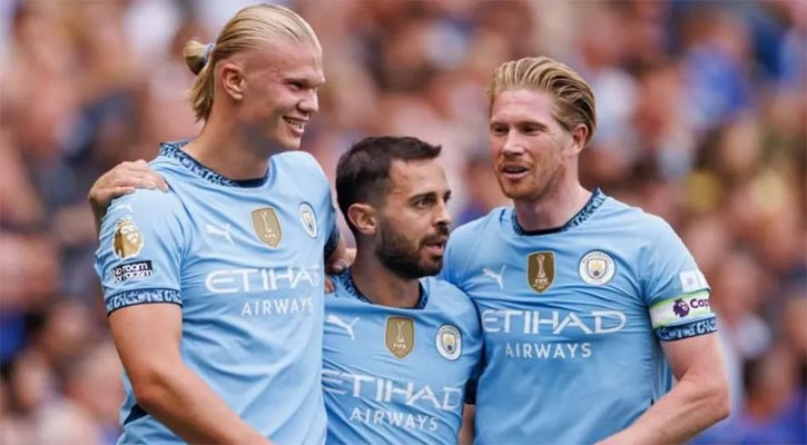 Man City open title defence with victory at Chelsea