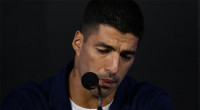 Emotional Suarez announces Uruguay retirement