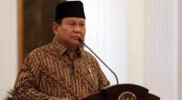 Indonesia leader sworn in with largest cabinet in decades
