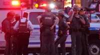 Police officer among four dead in Manhattan office building shooting