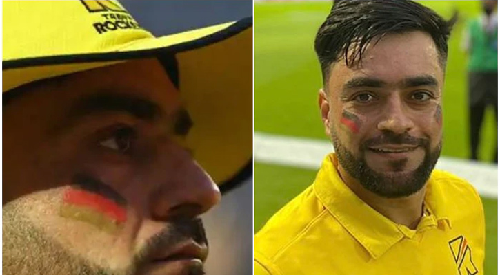 গালে আফগানিস্তানের পতাকা এঁকে মাঠে রশিদ খান